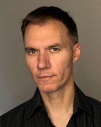 clinton-irey-director-of-print-broadcast-talentunlimited-talent-agency-kansas-city-bio